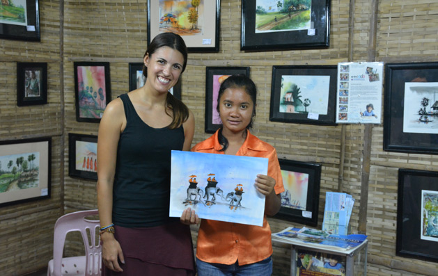 Alissa with the young artist of one of the paintings we bought