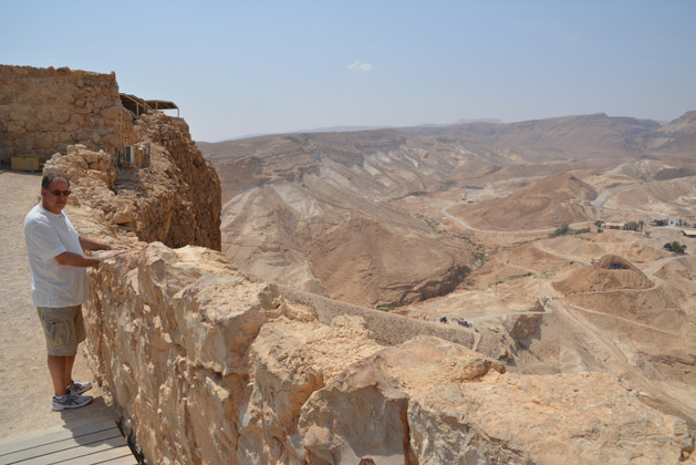 Dan's dad at the top of Masada.  The ramp built by the Romans can be seen in the background in the middle of the photo.